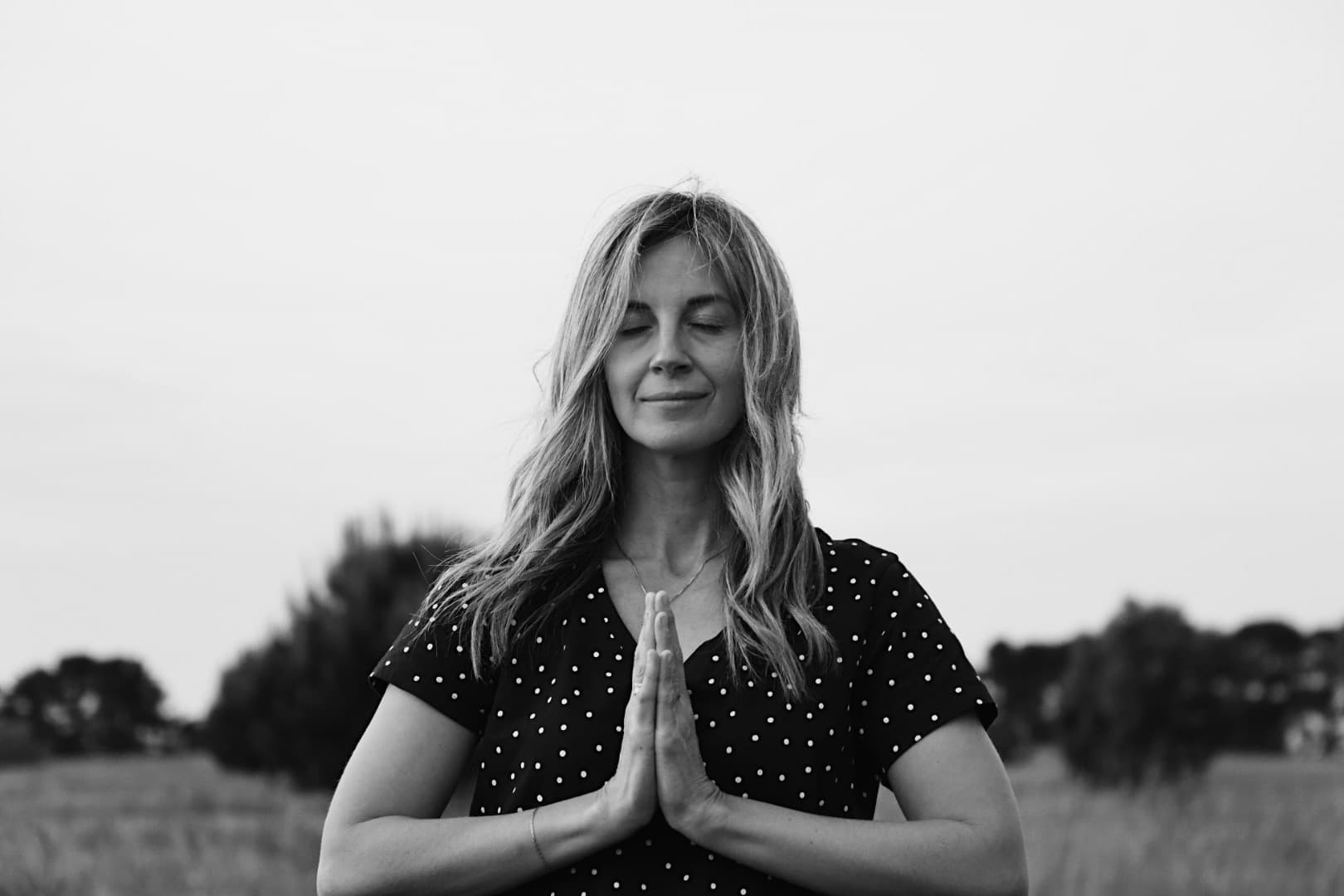 Holly Kent in prayer pose